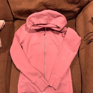 Lululemon size 2 rose colored hoodie.